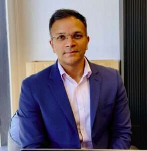 Ash Agarwal, CEO of SYMX.AI